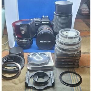 Konica FS-1 SLR 35mm film camera w/ various lenses & filters- film tested!